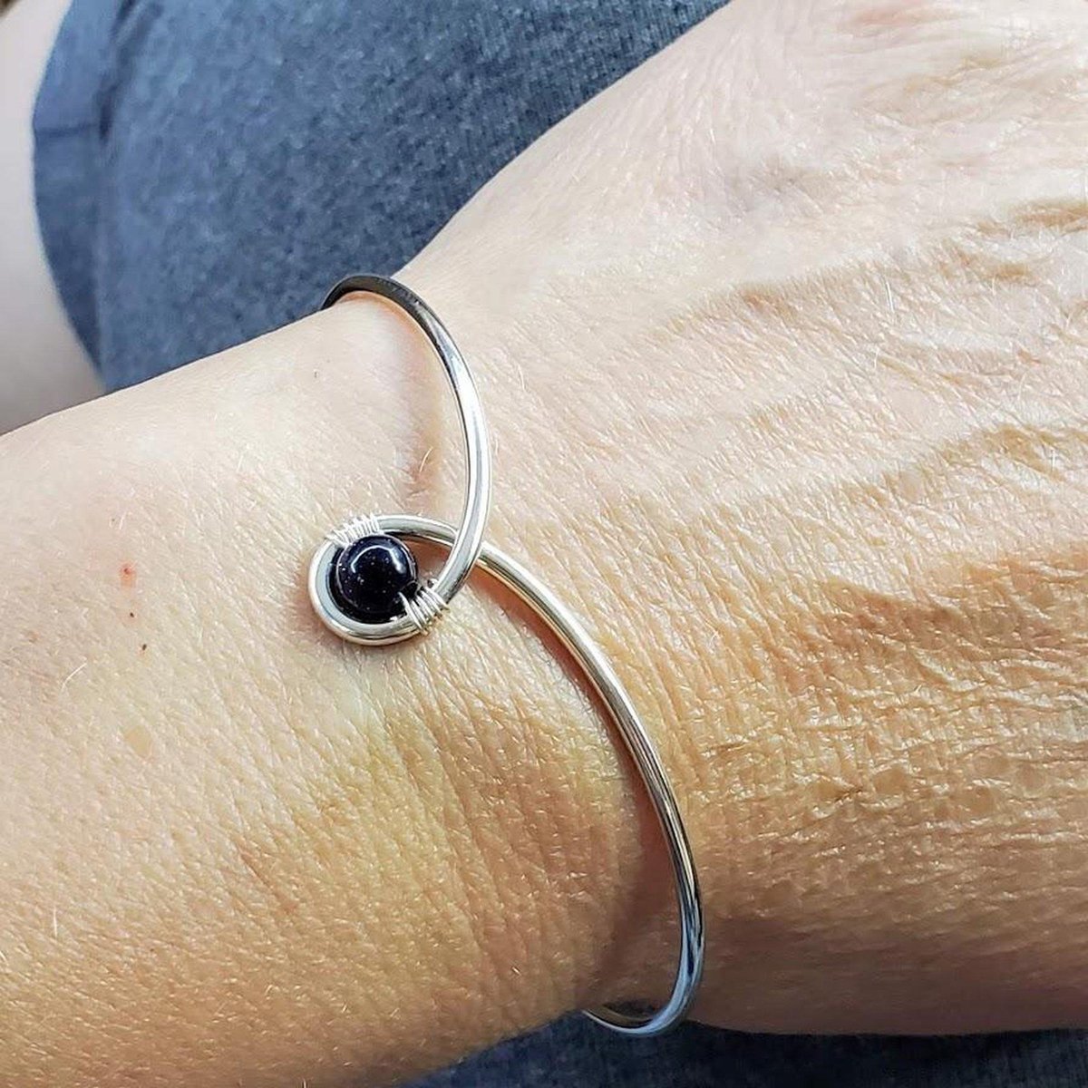 Child Abuse Awareness Teardrop Bangle with Blue Sandstone Bead - Handcrafted Sterling Silver Design with Unique Sparkle Bijou Her