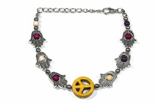 Hamsa Hand and Peace Charm Bracelet - Boho Style with Colorful Beads
Length: 6 inches with 1.5 inch extender. Lobster clasp closure. Base metal, beads. This bracelet features the divine Hamsa Hand - Bracelets - Bijou Her - Color -  - 