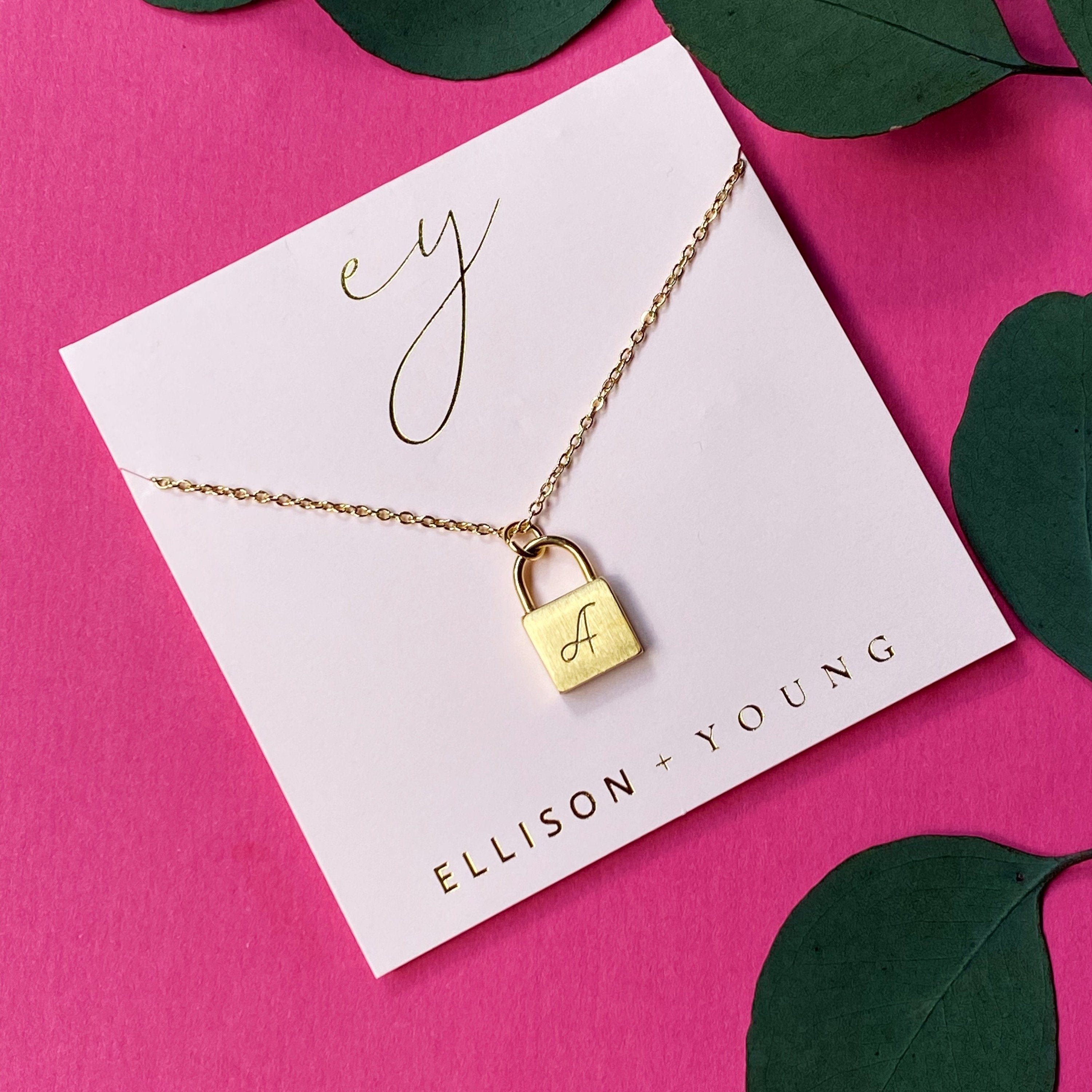 Scripted Initial Necklace with Lock Pendant - Brushed Finish, Blush Color Card Packaging
Keywords: initial necklace, lock pendant, scripted font, brushed finish, blush color, packaging. - Necklaces - Bijou Her -  -  - 