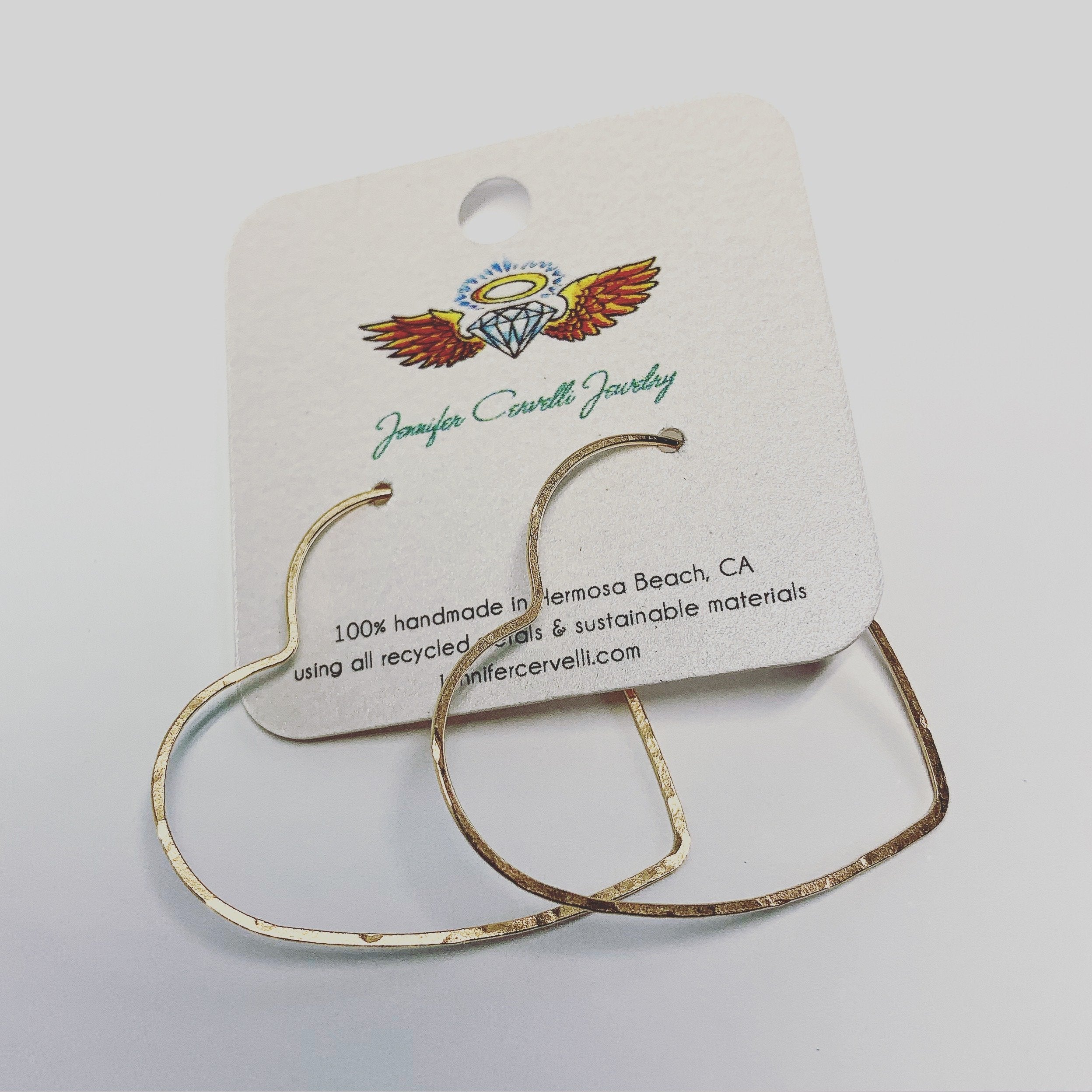 Handmade Heart Hoop Earrings - Elegant and Lightweight Jewelry<p>These classic heart-shaped hoops are hand-formed from 20 gauge wire and feature a hammered texture for added shine. Measuring 1.5" across, they are part of The Spirit Collection and - Jewelry & Watches - Bijou Her -  -  - 