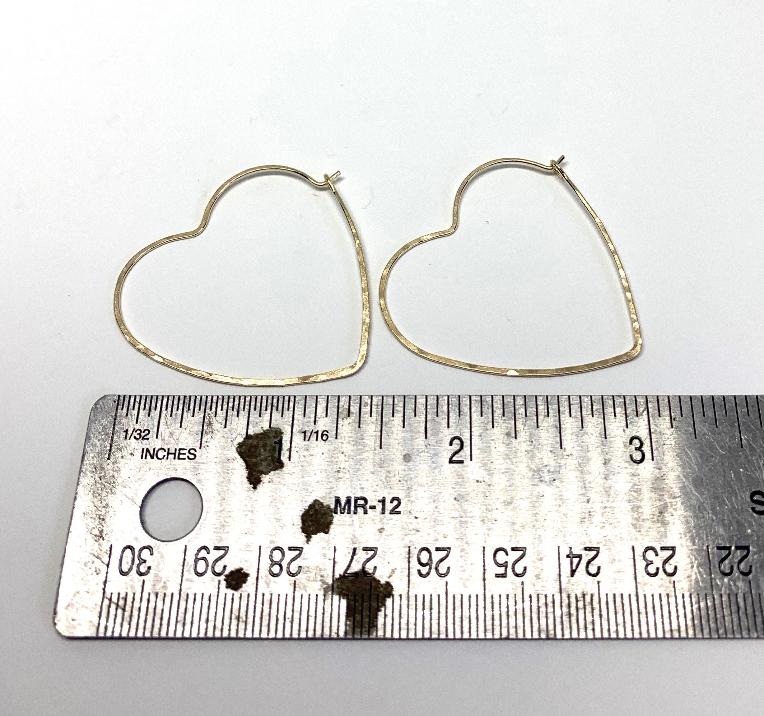 Handmade Heart Hoop Earrings - Elegant and Lightweight Jewelry<p>These classic heart-shaped hoops are hand-formed from 20 gauge wire and feature a hammered texture for added shine. Measuring 1.5" across, they are part of The Spirit Collection and - Jewelry & Watches - Bijou Her -  -  - 