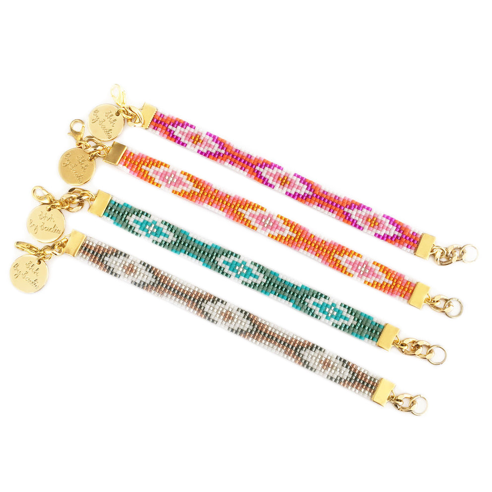 Hand-Woven Gold-Plated Bracelets in Pink, Orange, Blue, and Gold
Description: These stunning bracelets are hand-woven using traditional bead loom techniques and feature 24 carat gold plated chain. Perfect for stacking, they come in a variety - Jewelry & Watches - Bijou Her -  -  - 