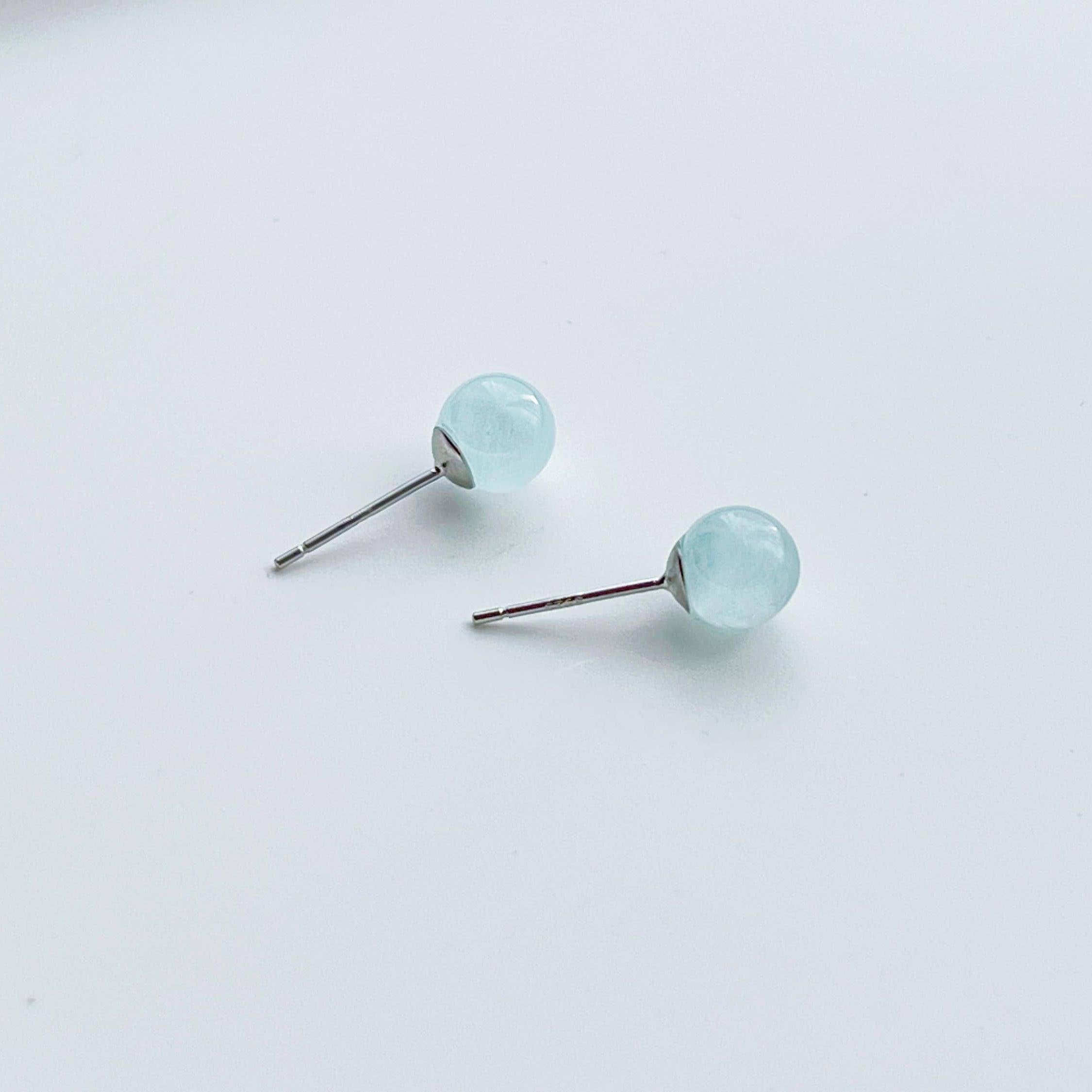 March Birthstone Aquamarine Stud Earrings - Light Blue Gemstone - Sterling Silver
Description: Natural aquamarine crystal symbolizing sea, clarity, and harmony. Comes in a complimentary gift box. Stone size around 7mm. Sold in pairs. Choose - Jewelry & Watches - Bijou Her -  -  - 