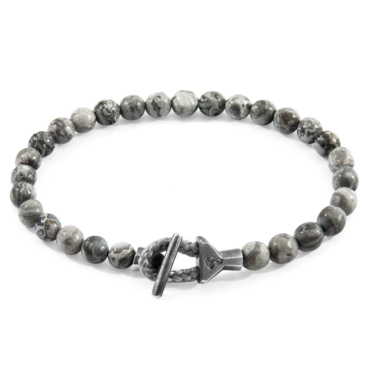 Grey Jasper Mantaro Silver Stone Bracelet: Handcrafted in Great Britain
This minimalist ANCHOR & CREW bracelet features genuine grey jasper stone beads, marine-grade rope, and a sterling silver clasp. Available in 4 sizes. - Jewelry & Watches - Bijou Her -  -  - 