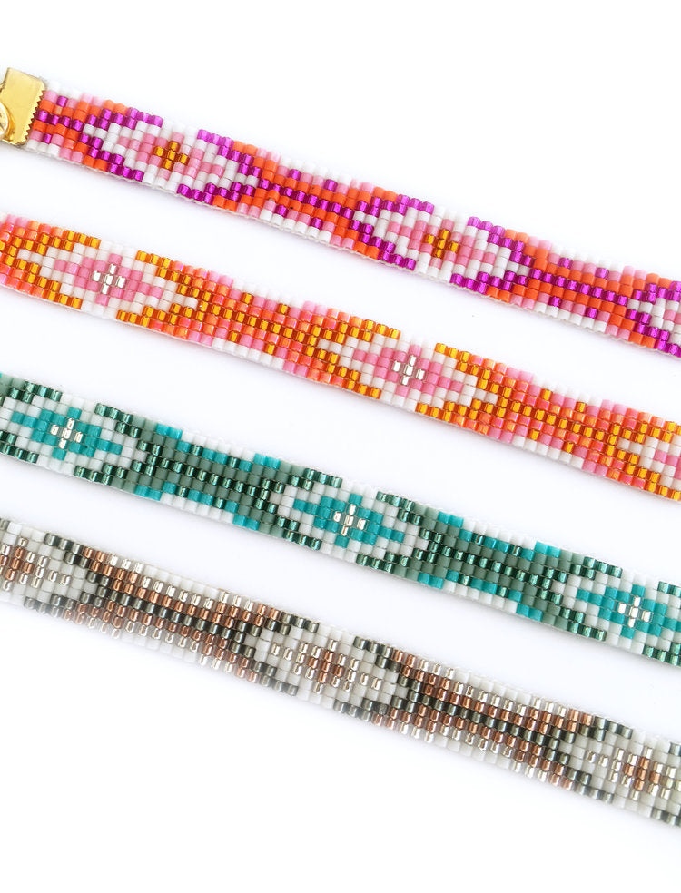 Hand-Woven Gold-Plated Bracelets in Pink, Orange, Blue, and Gold
Description: These stunning bracelets are hand-woven using traditional bead loom techniques and feature 24 carat gold plated chain. Perfect for stacking, they come in a variety - Jewelry & Watches - Bijou Her -  -  - 