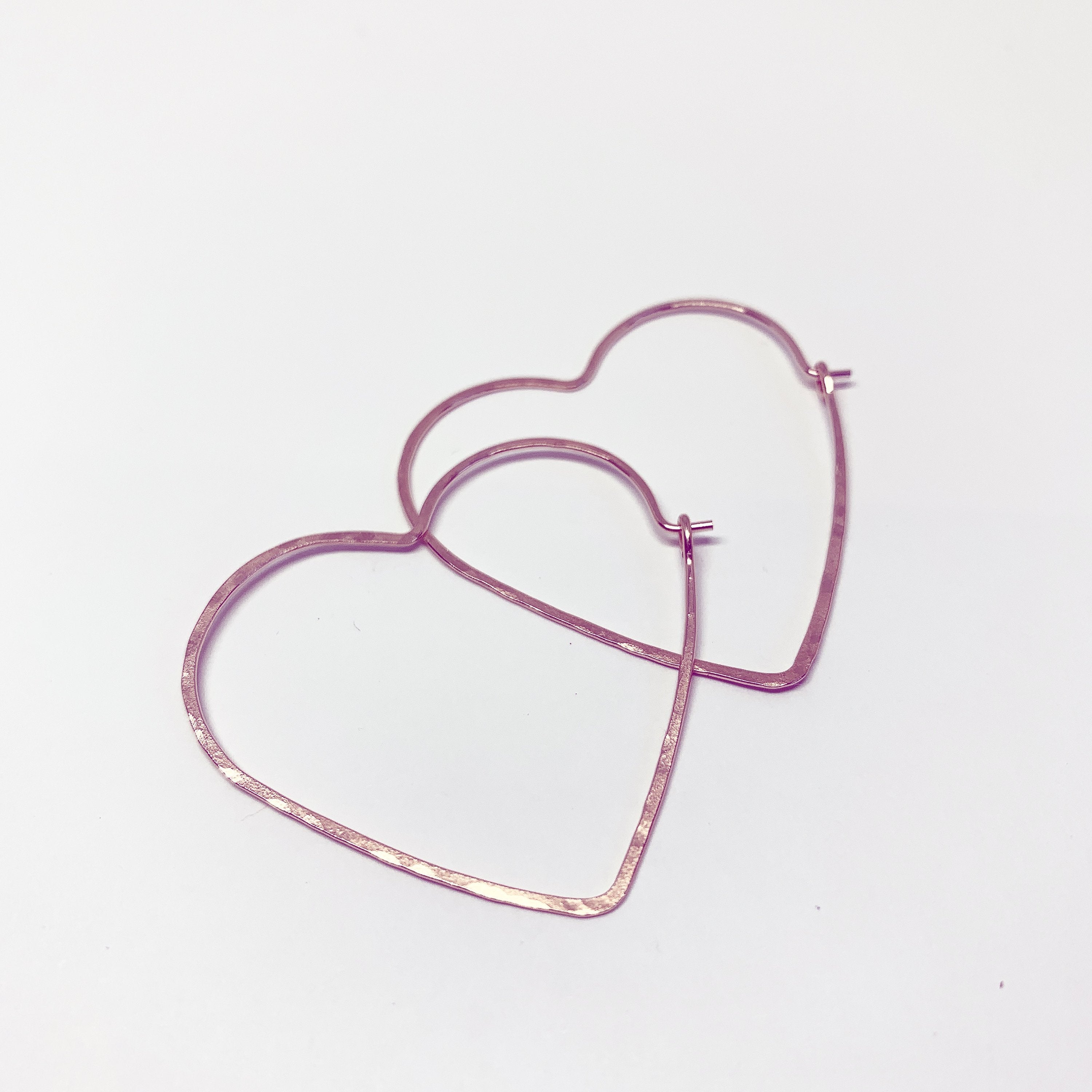 Handmade Heart Hoop Earrings - Elegant and Lightweight Jewelry<p>These classic heart-shaped hoops are hand-formed from 20 gauge wire and feature a hammered texture for added shine. Measuring 1.5" across, they are part of The Spirit Collection and - Jewelry & Watches - Bijou Her -  -  - 